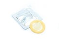 A Picture of an regular condom isolated on a white background. Royalty Free Stock Photo