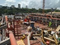 Picture of repairs, maintenance, modifications ongoing on a vessel main deck in a ship yard