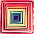 Picture of retro multicolor boxes toy that forms into geometrical square pattern