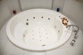Picture of round white hot baths bathroom decorated with bright tiles Royalty Free Stock Photo
