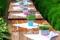 Row of decorated tables on a gardenpath