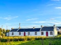 Row of white traditional cottages on Achill Island, Mayo Royalty Free Stock Photo