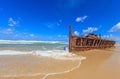 Picture of a rusted shipwreck at Seventy Five Mile Beach on Frazer Island in Australia Royalty Free Stock Photo