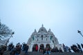 Crowd of tourists in front of Sacre Coeur Basilica in Montmartre, Paris. Royalty Free Stock Photo