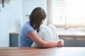 Sad teenager sitting alone at home Royalty Free Stock Photo