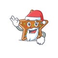 A picture of Santa gingerbread star mascot picture style with ok finger