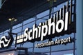 Picture of Schiphol Airport entrance sign located on the facade of the transportation center