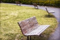 Set of wooden park benches in Highland Park Rochester, New York