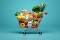 Picture of shopping cart filled with variety of fresh fruits and vegetables. Royalty Free Stock Photo