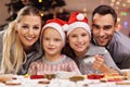 Happy family preparing Christmas biscuits Royalty Free Stock Photo