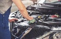 Picture showing muscular car service worker repairing vehicle Royalty Free Stock Photo