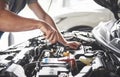 Picture showing muscular car service worker repairing vehicle Royalty Free Stock Photo