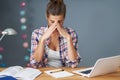 Tired female student learning till late at home Royalty Free Stock Photo