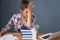 Tired female student learning till late at home Royalty Free Stock Photo