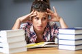 Tired female student learning till late at home Royalty Free Stock Photo