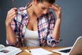 Tired female student learning till late at home Royalty Free Stock Photo