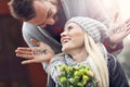 Picture showing young couple with flowers dating in the city