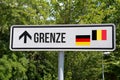 A shield and border between Germany and Belgium