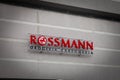 PECS, HUNGARY - SEPTEMBER 25, 2023: Rossmann logo in front of their main shop for Pecs. Rossmann is a German chain of drugstores,