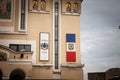 CARANSEBES, ROMANIA - SEPTEMBER 16, 2022: Coat of arms of Patriarhia Romana, the patriarchate of romania, on a church in