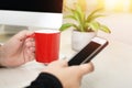 Picture of phone and cup. Royalty Free Stock Photo