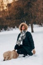 Picture of smiling girl with labrador on background of trees Royalty Free Stock Photo