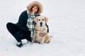 Picture of smiling woman with labrador in winter park Royalty Free Stock Photo