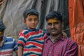 Picture of son and father setting at temple steps in India Royalty Free Stock Photo