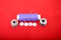 Picture of spool thread, needle, bobbin and button Royalty Free Stock Photo