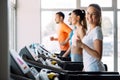 Picture of people running on treadmill in gym Royalty Free Stock Photo