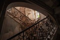 Abandoned stairs and stairway of a decaying manor or mansion, in ruins, soon to be renovated, indoors