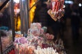 Candies, candy sticks, mainly gummy sweets and lollilpops, diversified, display in loose in a shop during a carnival or a fair