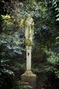 Statue in the middle of a green garden at Magnolia plantation in Charleston South Carolina Royalty Free Stock Photo