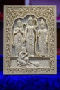 Picture of a stone sculpture of Hindu god lord Rama, Lakshmana, Sita and Hanuman idols displayed in a shop for sale in blurred