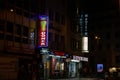 COLOGNE, GERMANY - NOVEMBER 6, 2022: Selective blur on kebab fast food restaurant at night in the center of Cologne. Doner kebap,