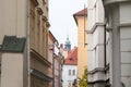 Typical narrow street of Stare Mesto, Michalska ulice, in the historical center of Prague, Czech Republic