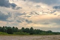 Dramatic cloudscape over abandoned airport runway