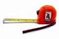 Tape measure in centimeters and inches on a white background Royalty Free Stock Photo