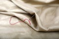 Picture of thread and needle attached in cloth Royalty Free Stock Photo