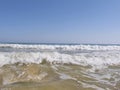 Incoming tide with blue skiy