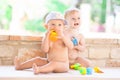 Picture of two baby child having fun playing outdoors, best friends, happy family, love and happiness concept Royalty Free Stock Photo