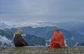 Two elderly shepherds sit on top of Razdhan Pass in Bandipora Kashmir Royalty Free Stock Photo