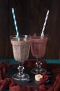 Picture of two wineglasses with straws and smoothies Royalty Free Stock Photo