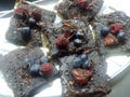 Uncooked cocoa and date`s brownies