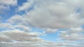 A picture of various clouds at different times of the day during the winter