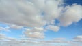 A picture of various clouds at different times of the day during the winter