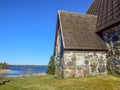 Picture with very old stone house, interesting wooden tile roof