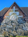 Picture with very old stone house, interesting wooden tile roof