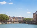 Panorama of Saone river and the Quais de Saone riverbank and riverside in the city center of Lyon, with a focus on old buildinds Royalty Free Stock Photo