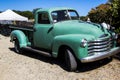 Vintage green truck at a market